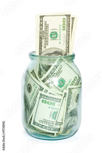 finances. money in the jar isolated on white