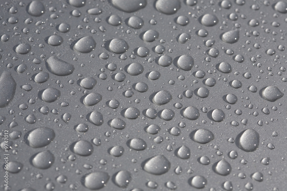 rain drops on metallic surface