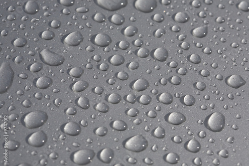 rain drops on metallic surface