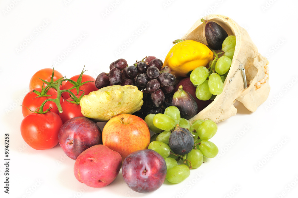 A human skull filled with fruits and vegetables, from behind. A human skull filled with fruits and vegetables, from behind.