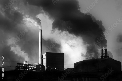 Fotografie Detail of pollution coming from factory smoke stacks