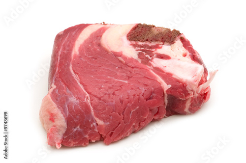 raw beef with bone on white background