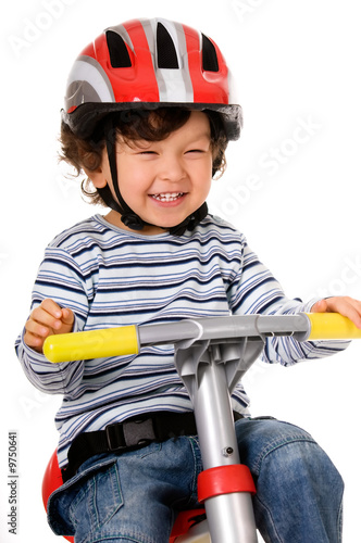 .little boy riding bicycle
