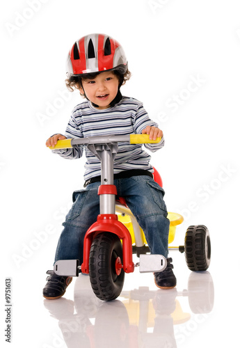 little boy riding bicycle