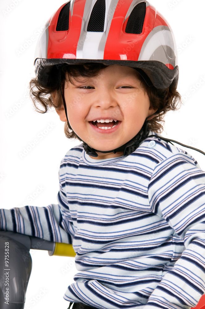The child in a protective helmet The child in a protective helmet