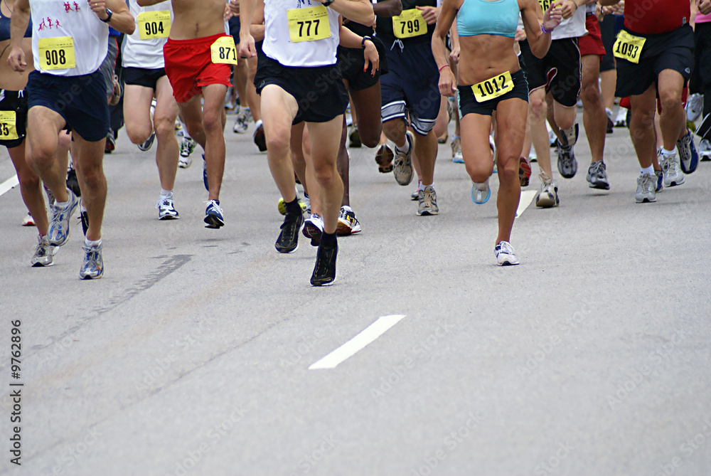 Big running race on foot during the day. Big running race on foot during the day.