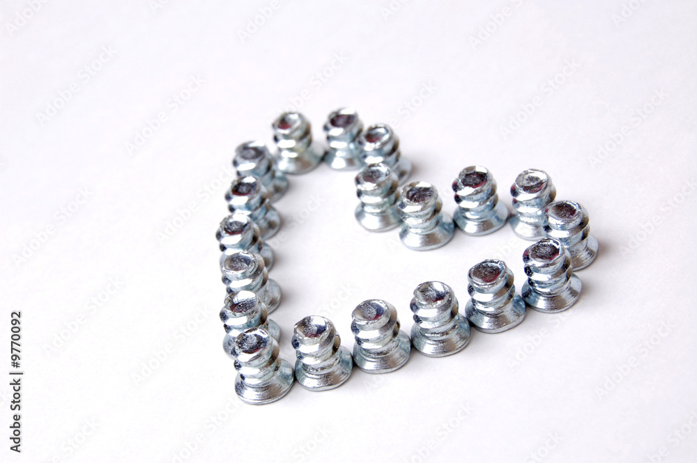 a heart made from blue screws a heart made from blue screws