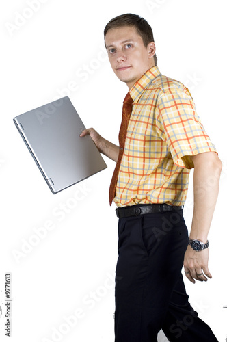 Office clerk, businessman walking with laptop computer in hand photo