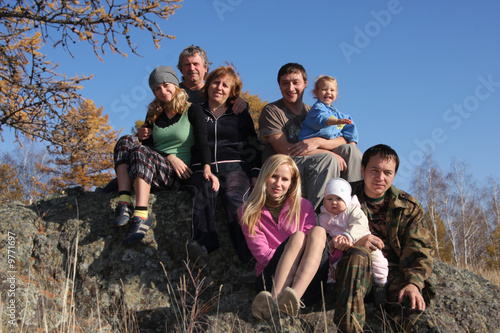 Big happy family in autumn park
