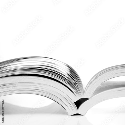 open books on white table