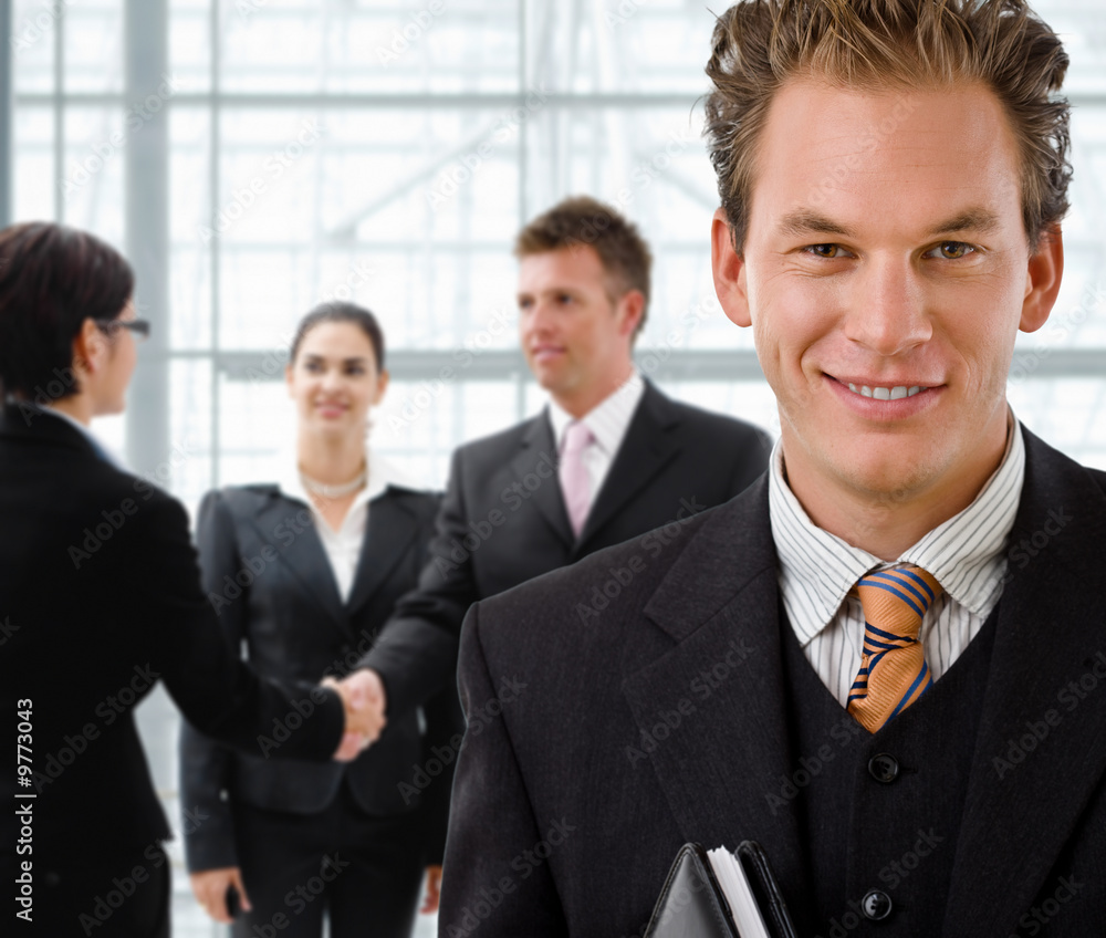 Team of business people, businessman in front, Team of business people, businessman in front,