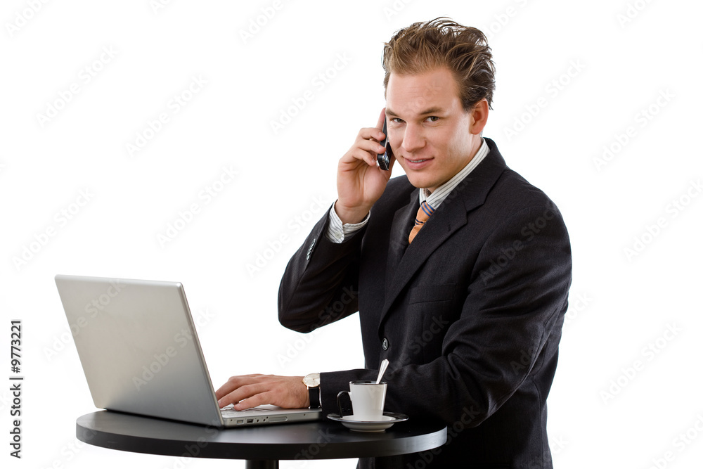 Businessman working on laptop and calling on phone, Businessman working on laptop and calling on phone,