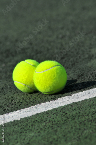 Two yellow tennis balls
