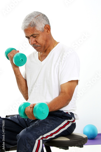 Senior Minority Man Working...