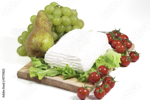 fresh giuncata cheese on cutting board isolated on white
