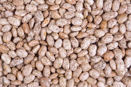 A texture of many pinto beans