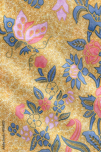 Yellow batik sarong with floral motif and a butterfly