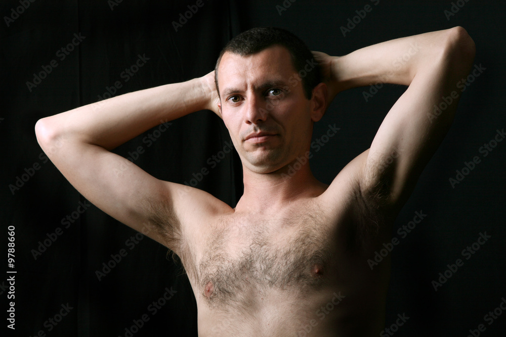 Obraz premium young man model on a black background