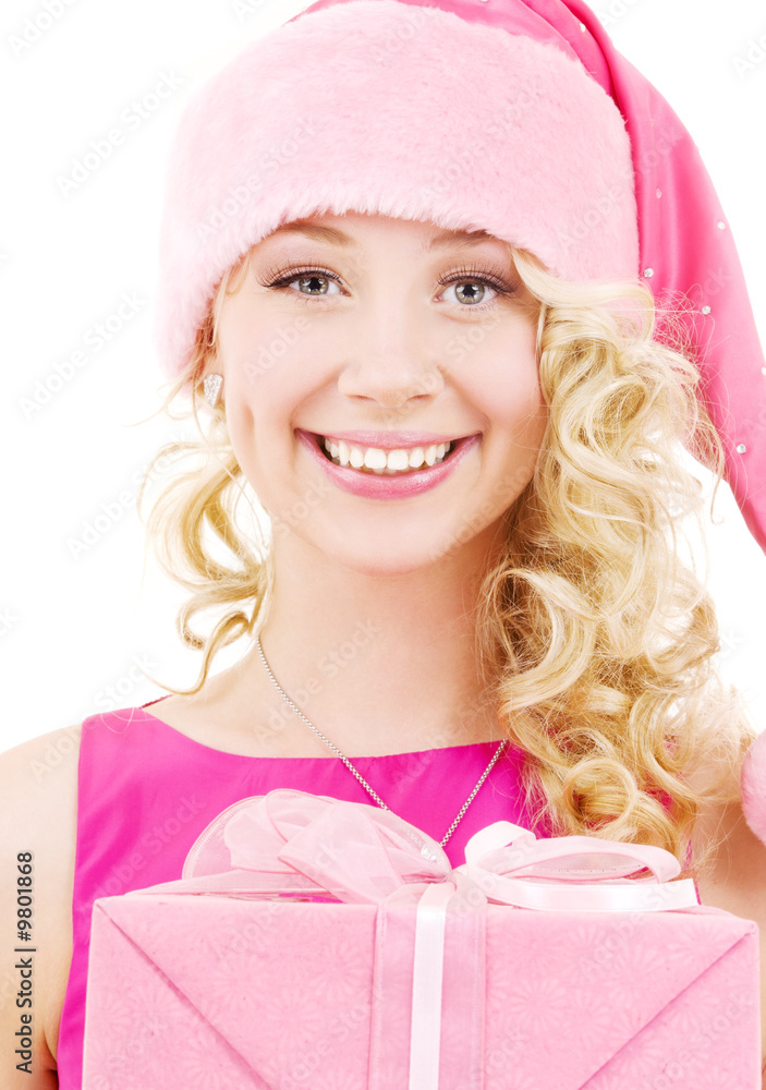 picture of cheerful santa helper girl with gift box picture of cheerful santa helper girl with gift box