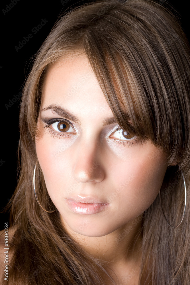 Portrait of the young woman. Isolated on black Portrait of the young woman. Isolated on black