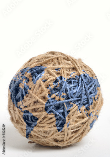 Earth map printed on a ball of string