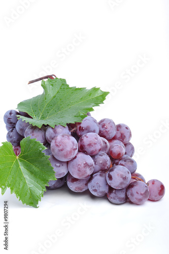 Cluster of grapes on white ...
