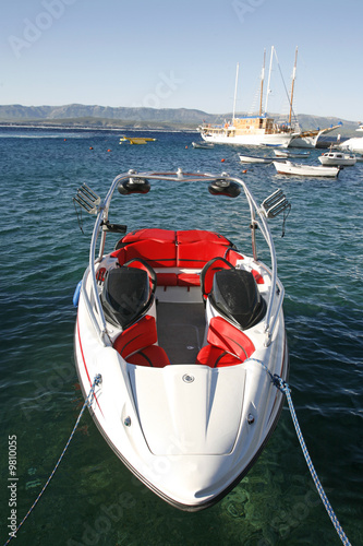 Fast modern motor boat docked in harbour , Croatia