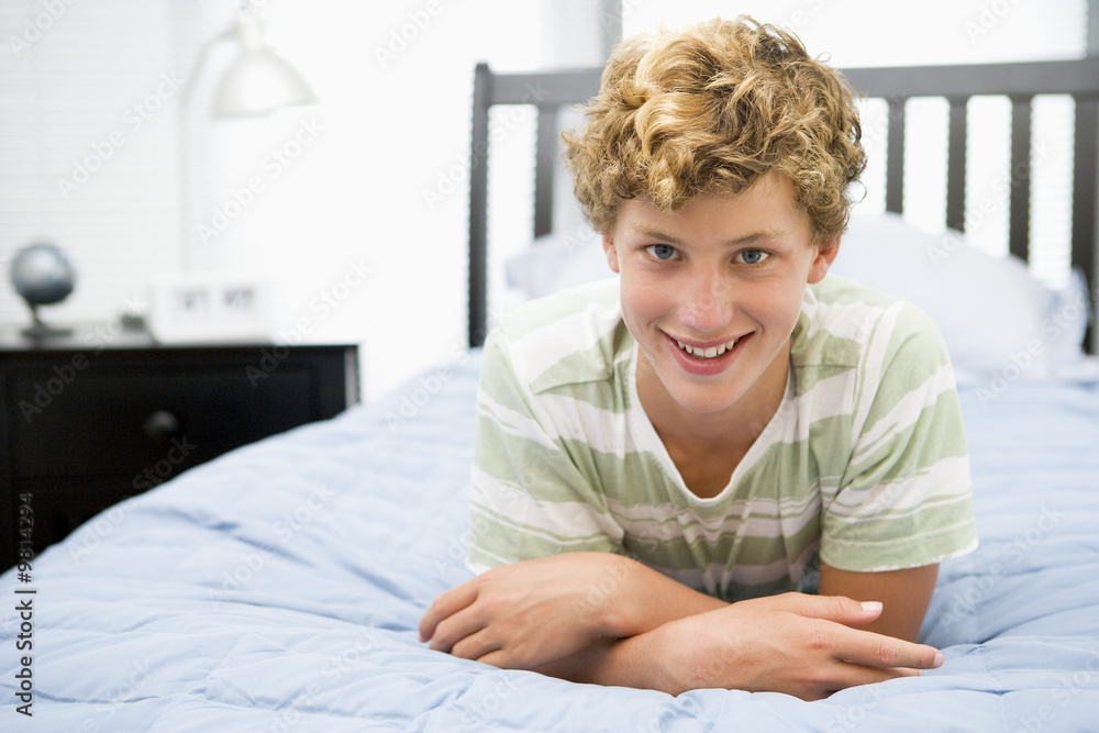 Teenage Boy Lying On Bed Teenage Boy Lying On Bed