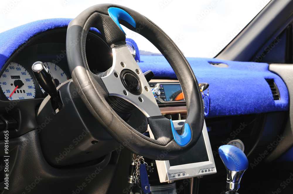 Inside the modern car with blue decoration.