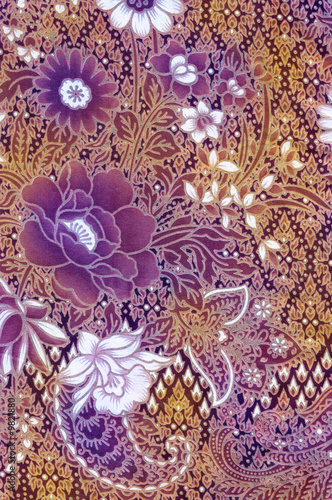 Golden batik sarong with white and purple floral motif