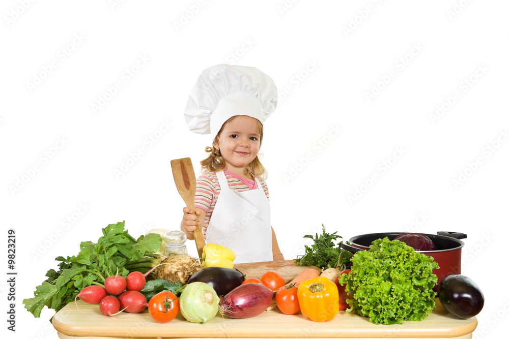 Happy little girl chef with lots of vegetables Happy little girl chef with lots of vegetables