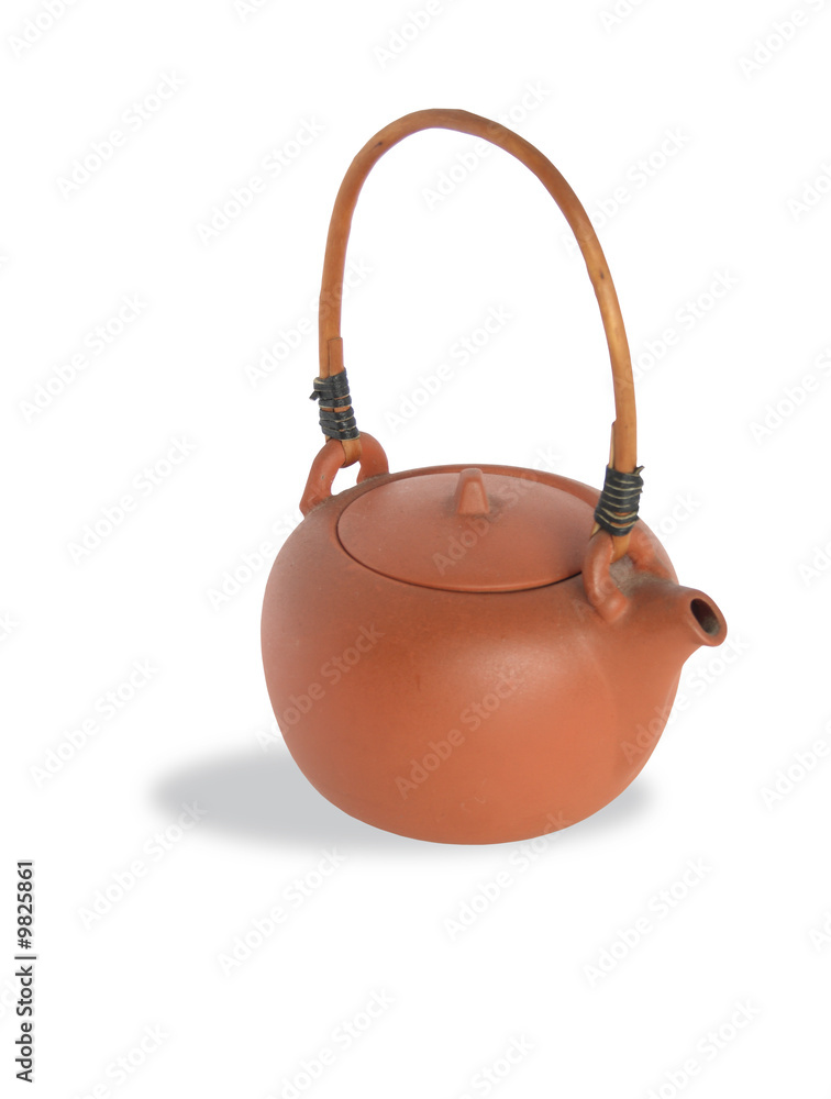 Isolated ceramic teapot with wicker wooden handle Isolated ceramic teapot with wicker wooden handle