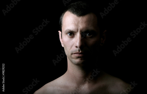 young man model on a black background