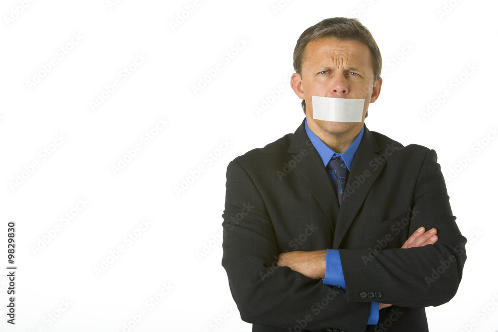 Businessman With His Arms Folded And His Mouth Taped Shut Businessman With His Arms Folded And His Mouth Taped Shut