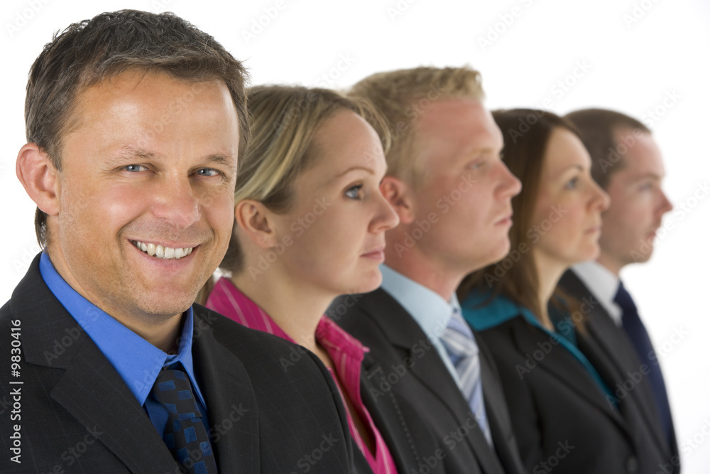 Group Of Business People In A Line Smiling Group Of Business People In A Line Smiling