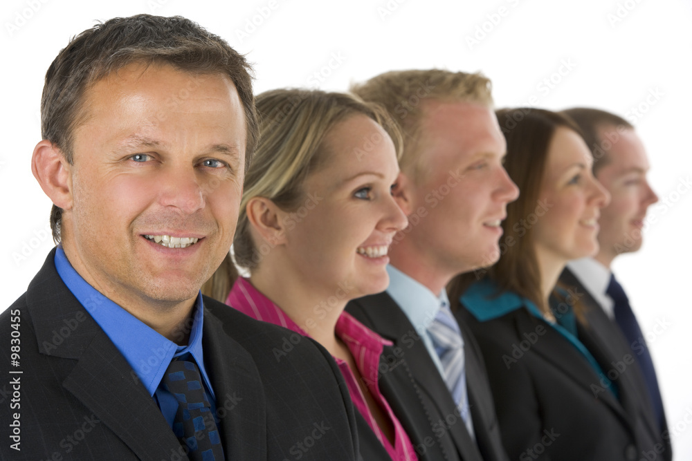 Group Of Business People In A Line Smiling Group Of Business People In A Line Smiling