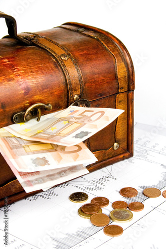 Business financial concept with diagrams chest and euro money