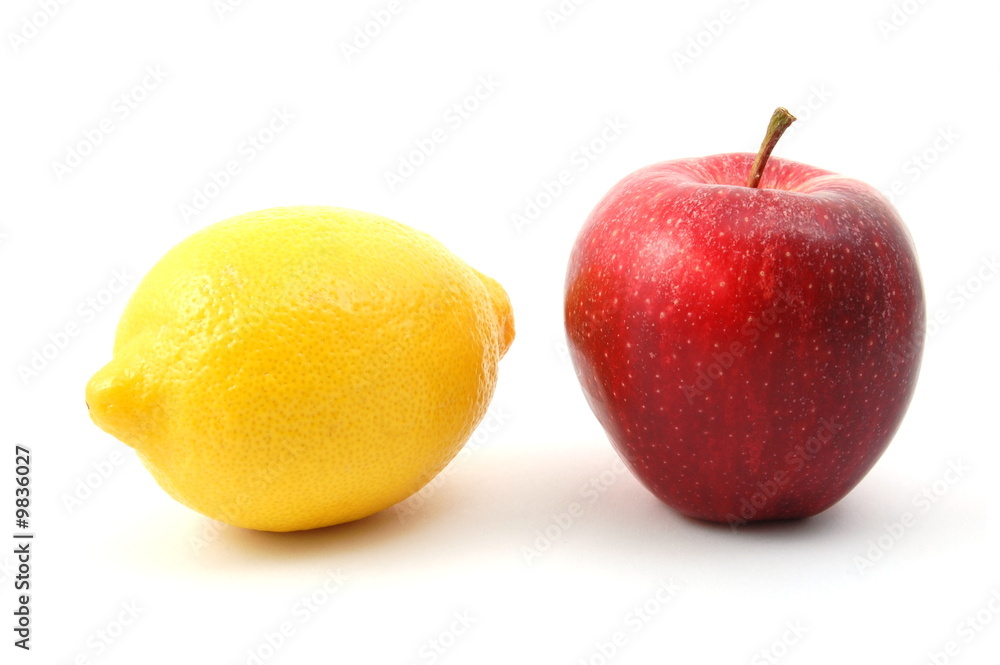 apple and lemon isolated on a white background apple and lemon isolated on a white background