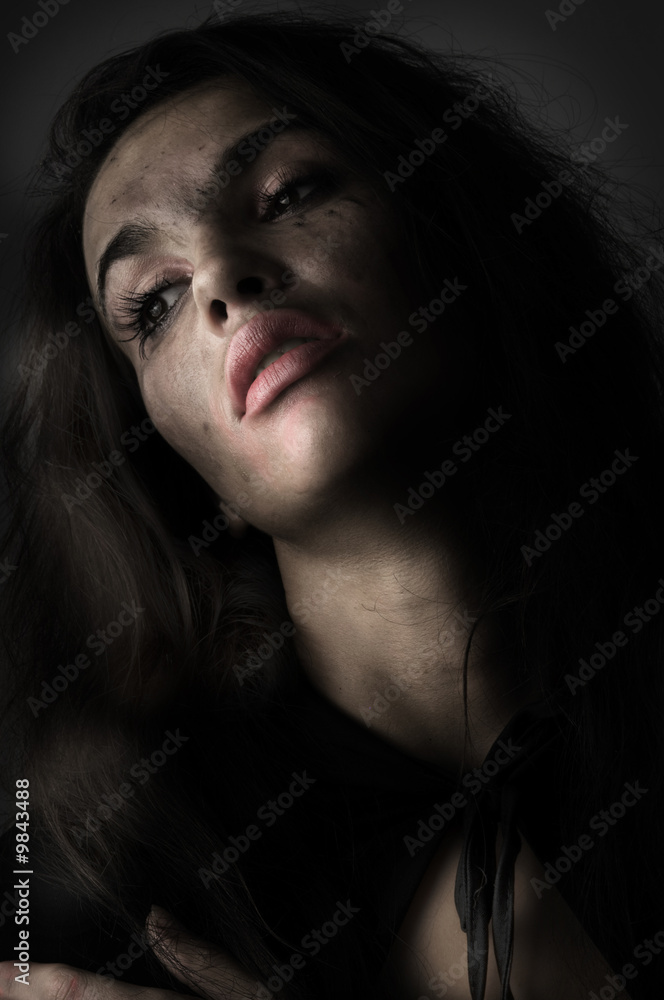 brunette in panic with broken make up in a desaturated portrait brunette in panic with broken make up in a desaturated portrait