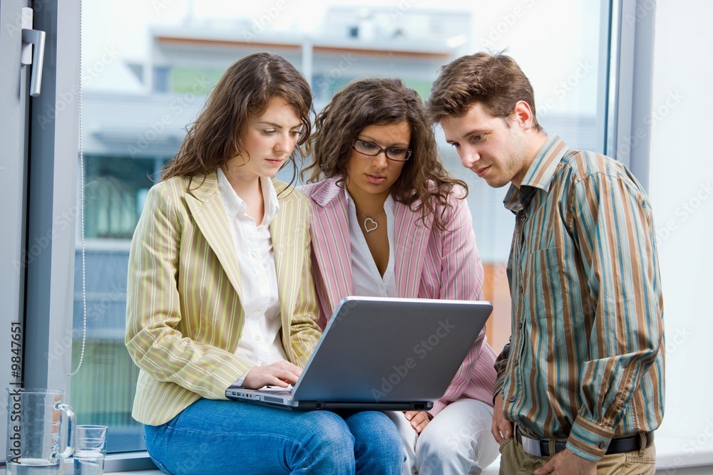 Young businesspeople having meeting at office, Young businesspeople having meeting at office,