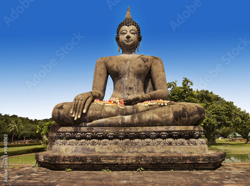 Canvas Print Seated Buddha statue at World Heritage Site, Sukhothai,Thailand