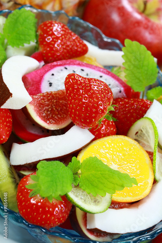 Delicious fresh fruits in bowl as dessert