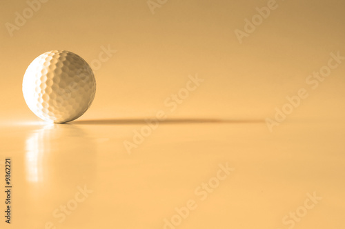 Closeup of golfball with dark shadows