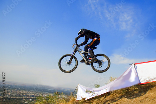 Biker jump in mountains,  Competition