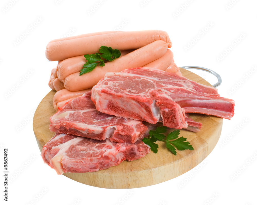 Raw Lamb chops and Beef Sausages Isolated over white background Raw Lamb chops and Beef Sausages Isolated over white background
