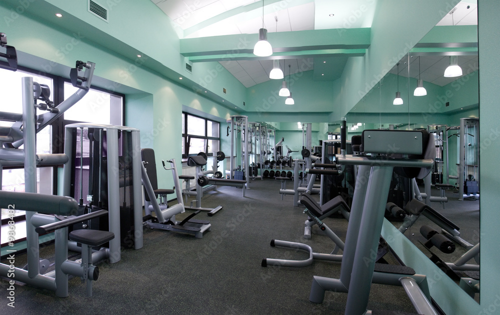 Room with gym equipment in the sport club Room with gym equipment in the sport club
