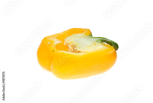 Half of yellow sweet pepper isolated on the white background