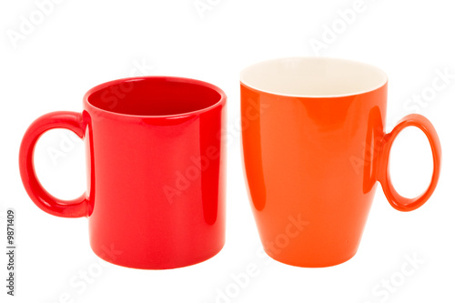 bright ceramic mugs expressed on white background