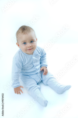 portrait of a cute, smiling baby boy on white