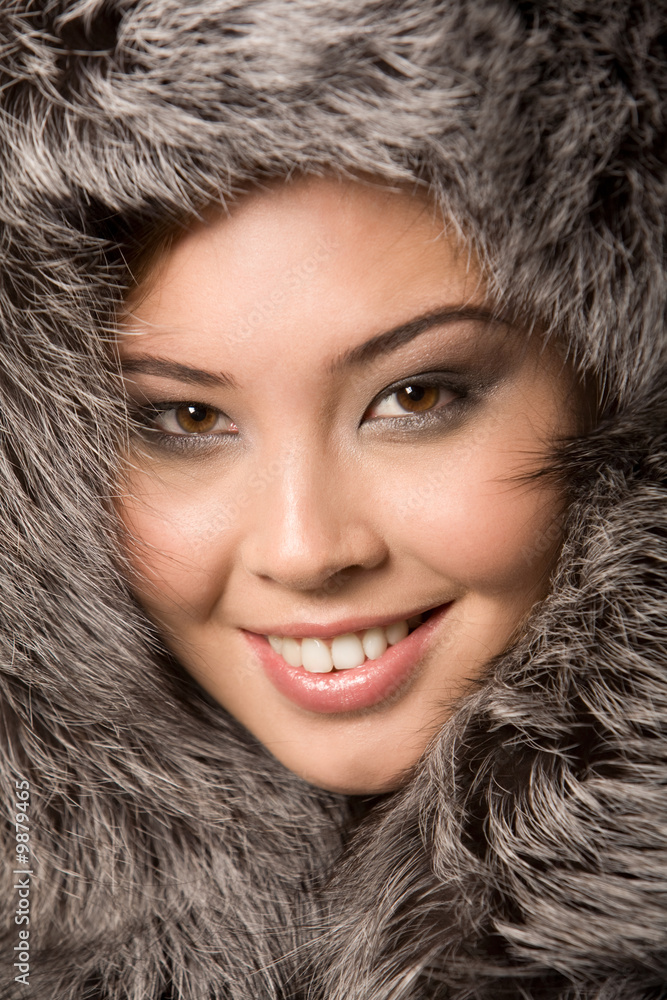 Close-up of young beautiful girl wearing fur-cap Close-up of young beautiful girl wearing fur-cap